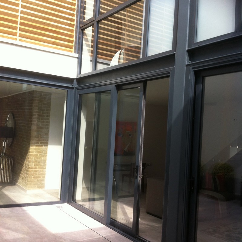 Anthracite aluminium sliding patio doors fitted in Seven Sisters