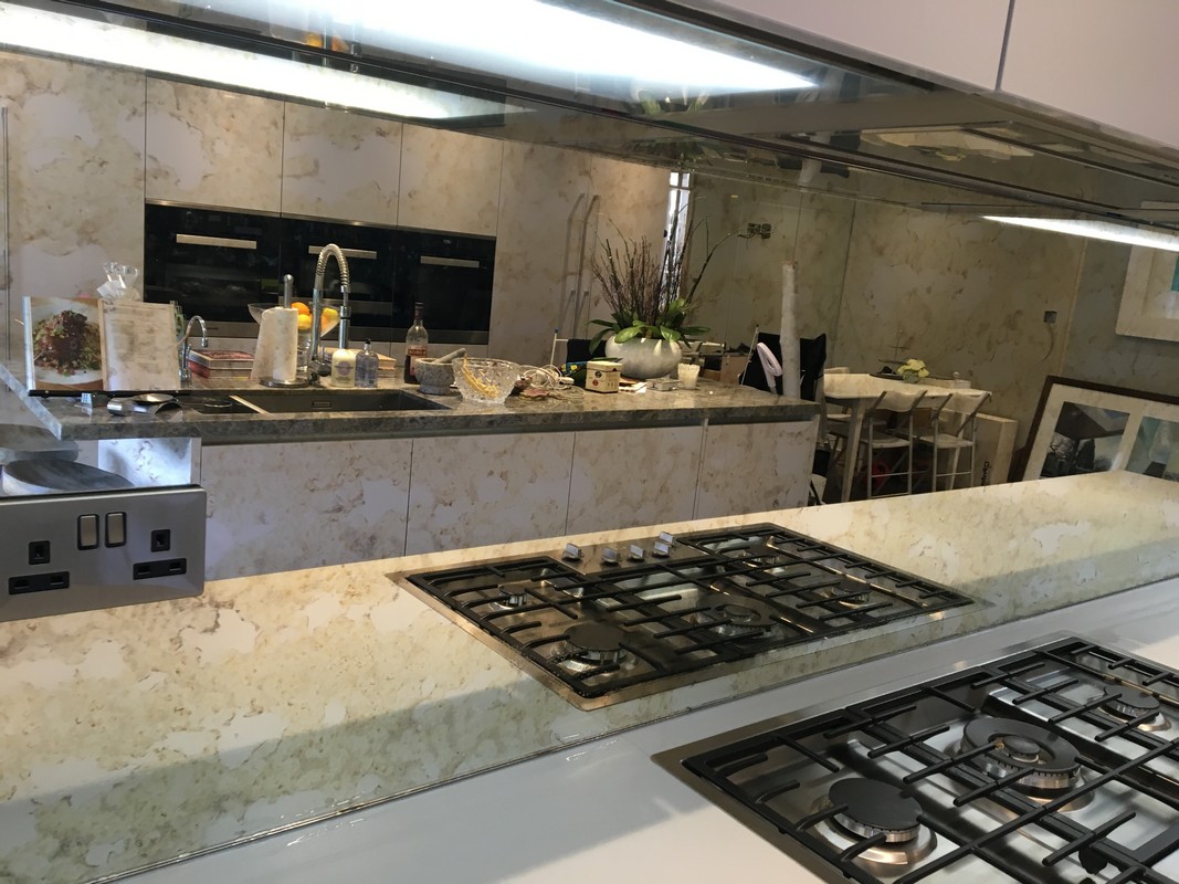 Mirror glass splashback in Seven Sisters luxury kitchen